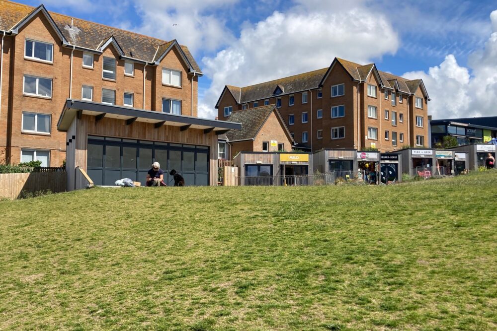 Image of Killacourt Bandstand and Seating with commercial units in the background