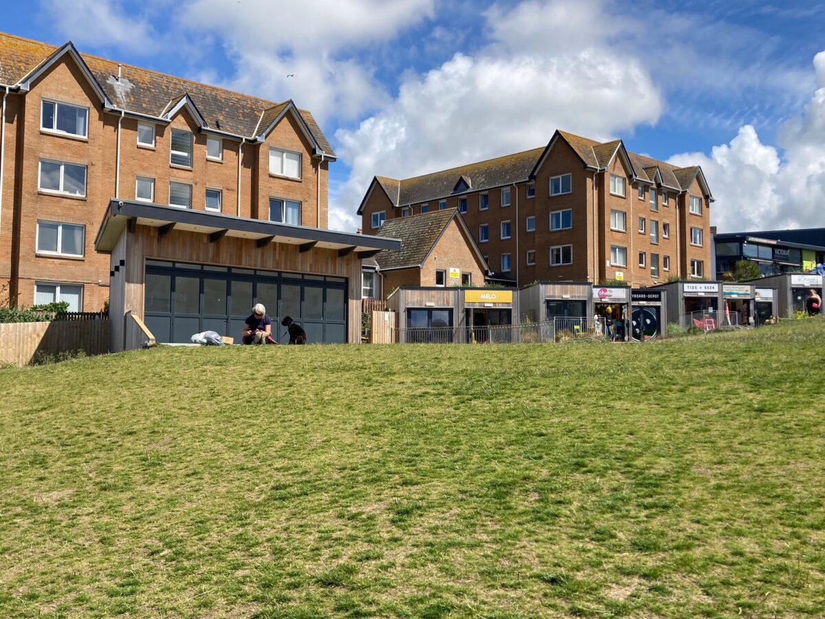 Image of Killacourt Bandstand and Seating with commercial units in the background