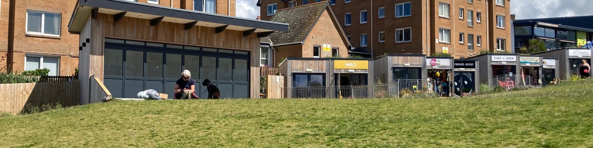 Image of Killacourt Bandstand and Seating with commercial units in the background