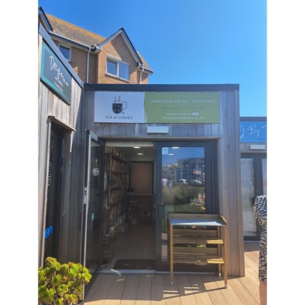 Tea & Leaves shop at the Killacourt with shelves of loose‑leaf teas and handmade products